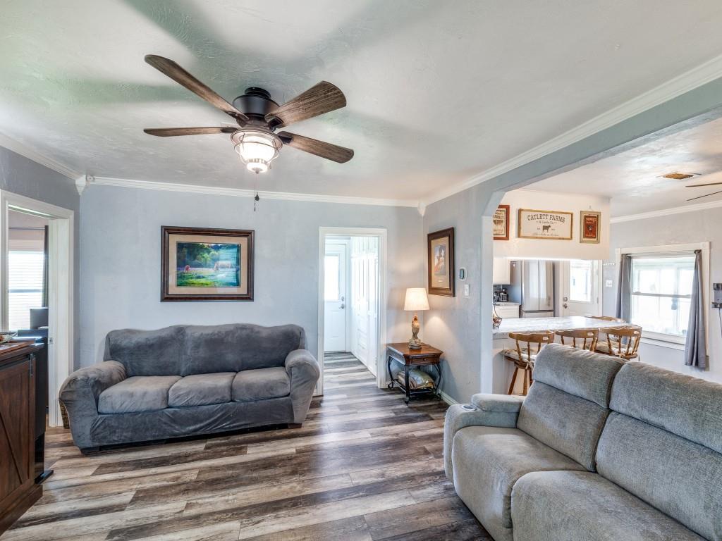 3061 Turkey Creek Road Sunset, TX 76270 - Photo 8 of 31 a living room with furniture and a wooden floor