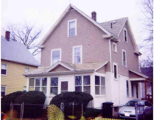 30 Converse Street Springfield, MA 01108 - Photo 1 of 1 a front view of a house with a yard