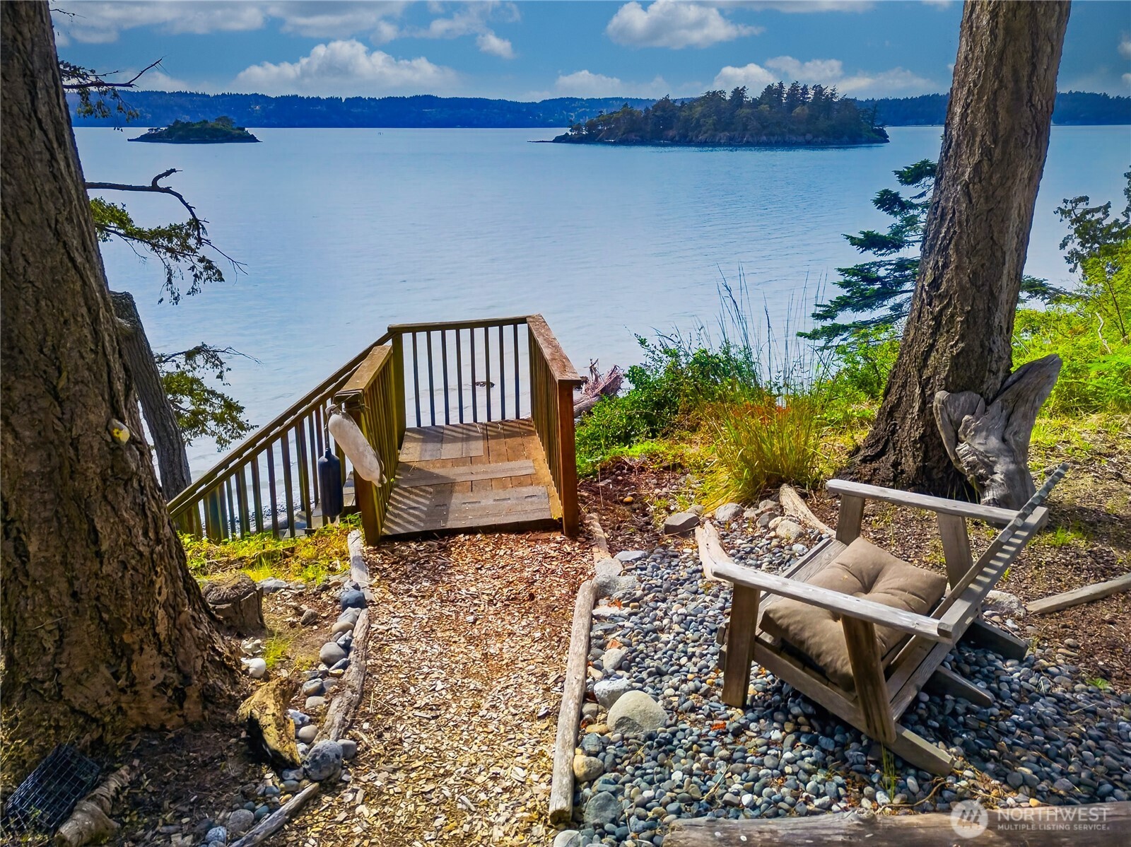 17946 Cobahud Road La Conner, WA 98257 - Photo 8 of 40 a balcony with wooden floor and outdoor seating