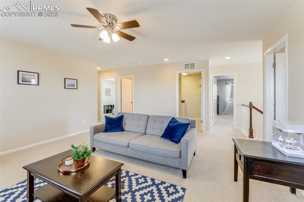 7122 Golden Acacia Lane Colorado Springs, CO 80927 - Photo 15 of 37 a living room with furniture