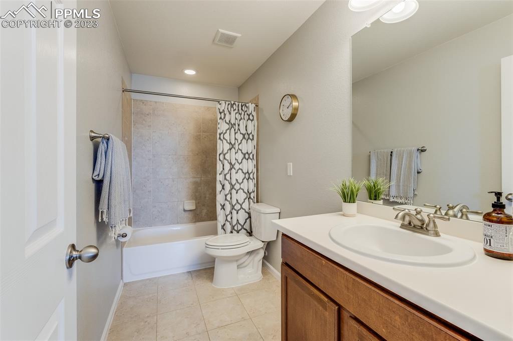 7122 Golden Acacia Lane Colorado Springs, CO 80927 - Photo 24 of 37 a bathroom with a sink toilet and shower