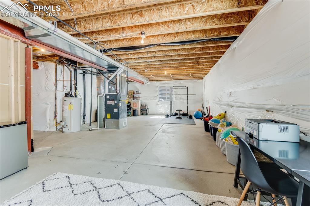 7122 Golden Acacia Lane Colorado Springs, CO 80927 - Photo 26 of 37 a view of garage with furniture