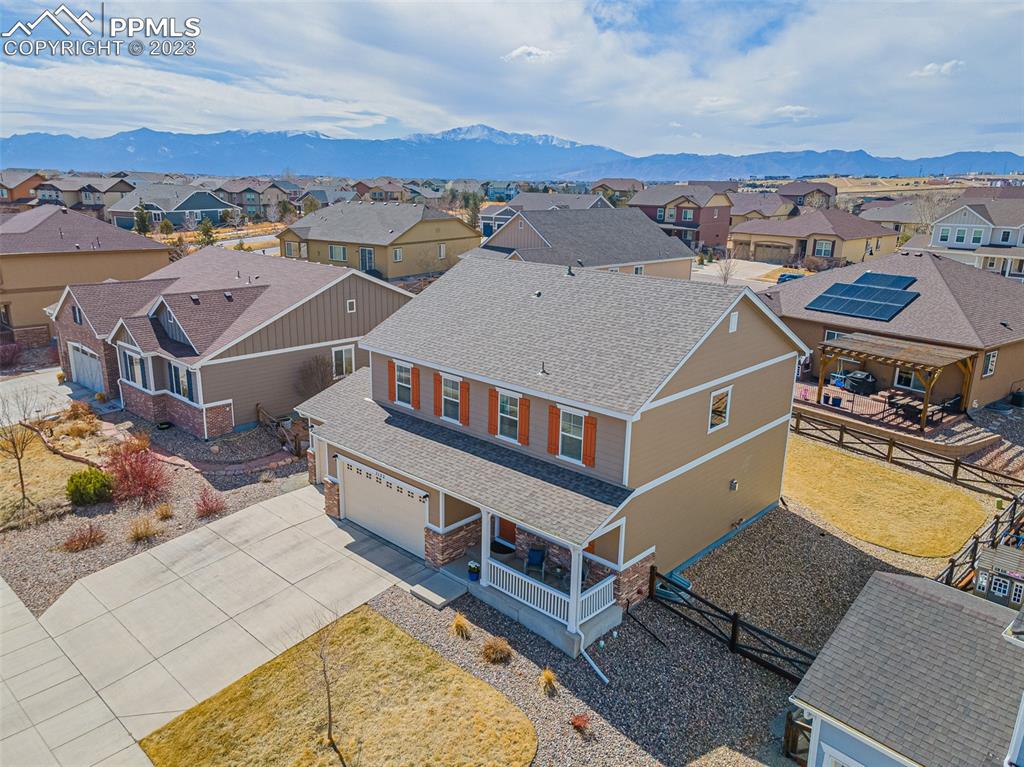 7122 Golden Acacia Lane Colorado Springs, CO 80927 - Photo 32 of 37 an aerial view of a house with a swimming pool