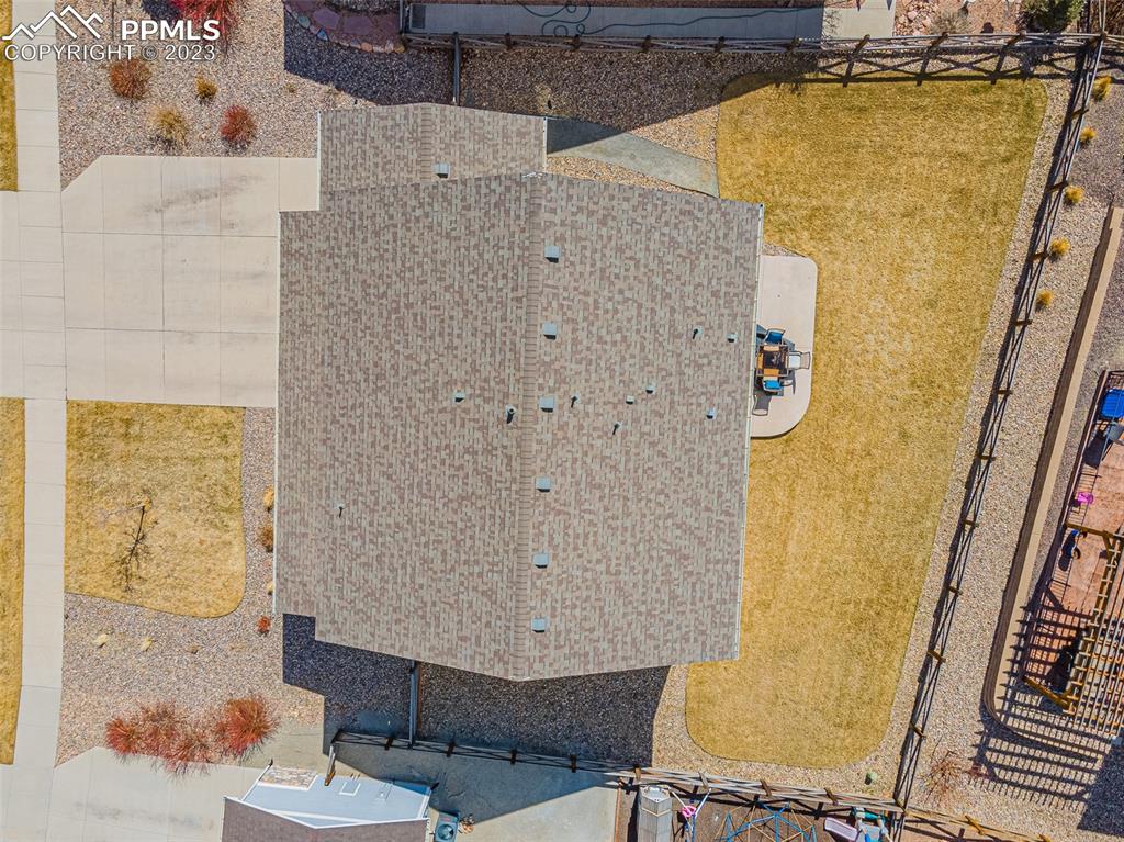 7122 Golden Acacia Lane Colorado Springs, CO 80927 - Photo 33 of 37 a view of a balcony with furniture and wooden floor