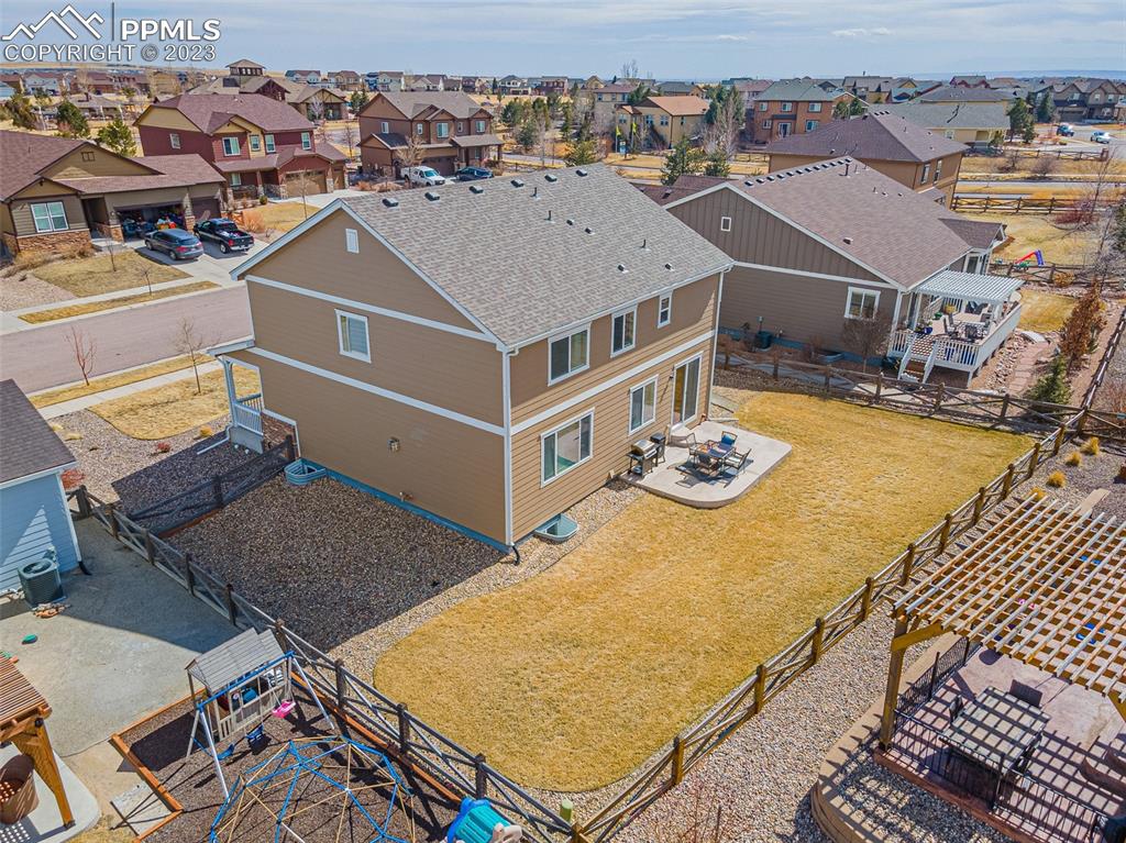 7122 Golden Acacia Lane Colorado Springs, CO 80927 - Photo 35 of 37 an aerial view of a house with swimming pool
