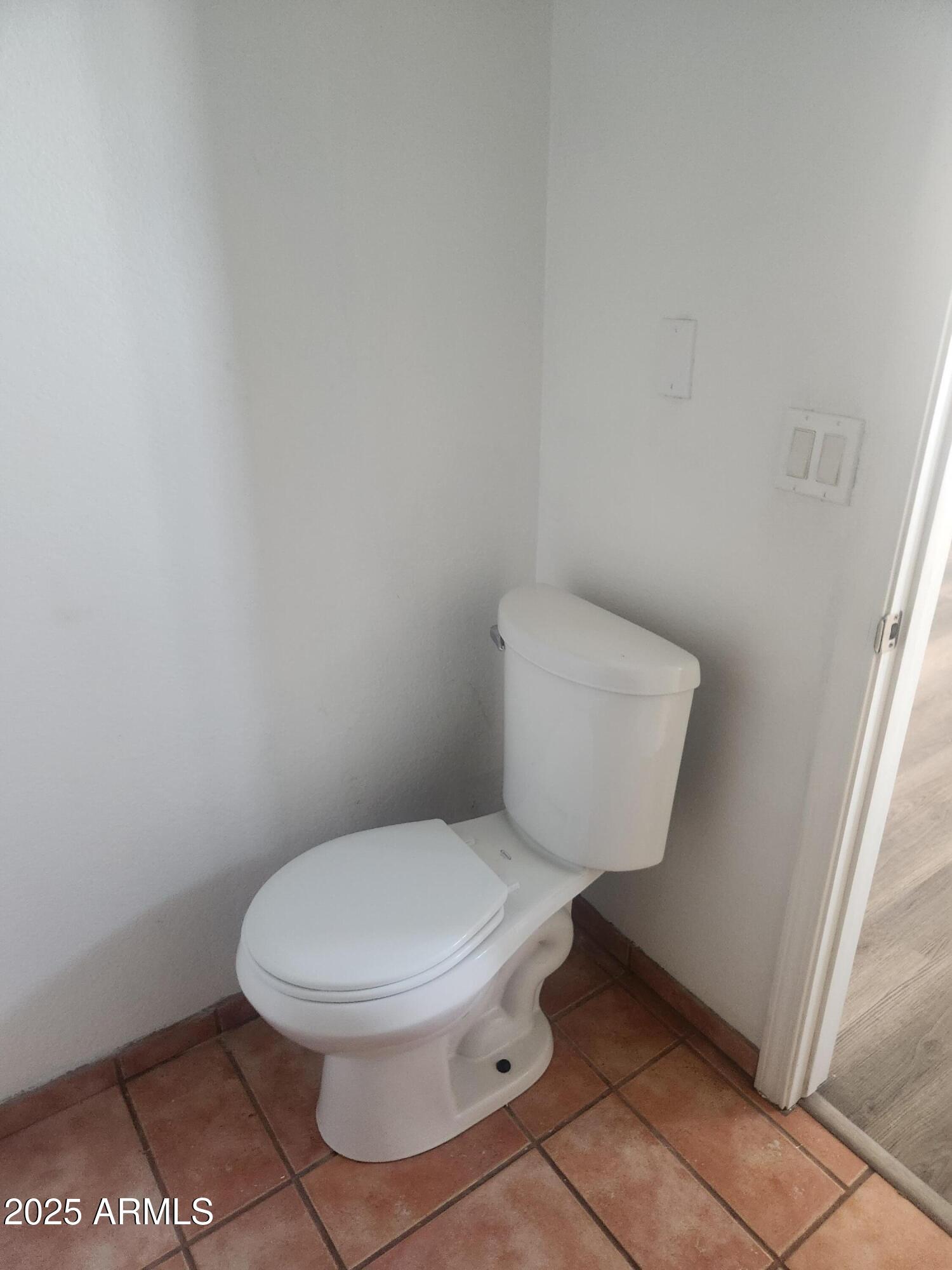 1940 East 13th Street Douglas, AZ 85607 - Photo 17 of 32 a white toilet sitting next to a white sink