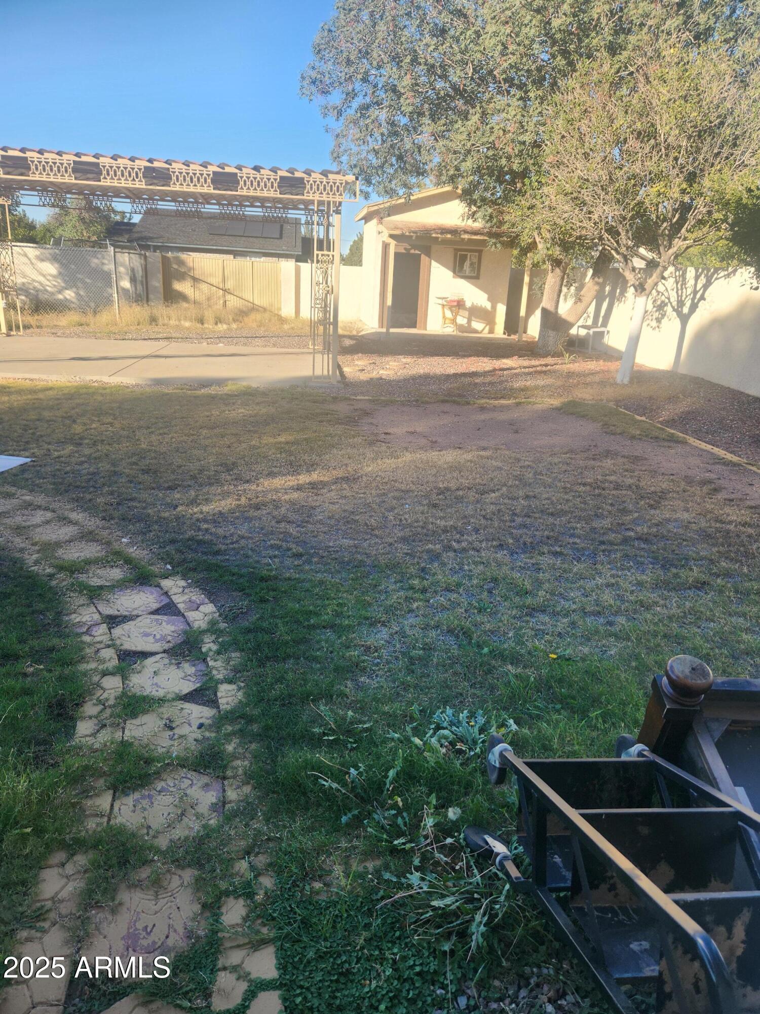 1940 East 13th Street Douglas, AZ 85607 - Photo 27 of 32 a view of a patio with table and chairs and wooden floor