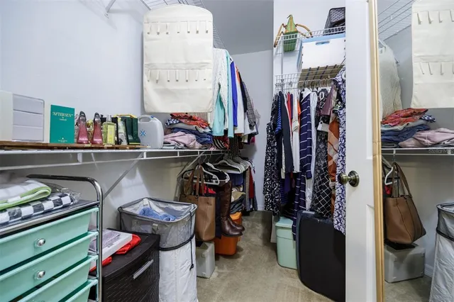 a bathroom with a double vanity sink mirror and toilet