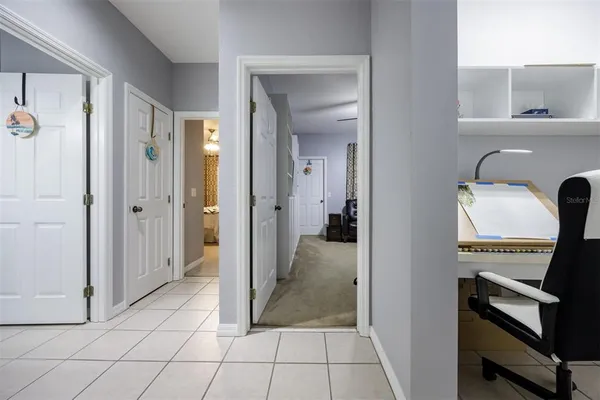 a room with a piano and wooden floor