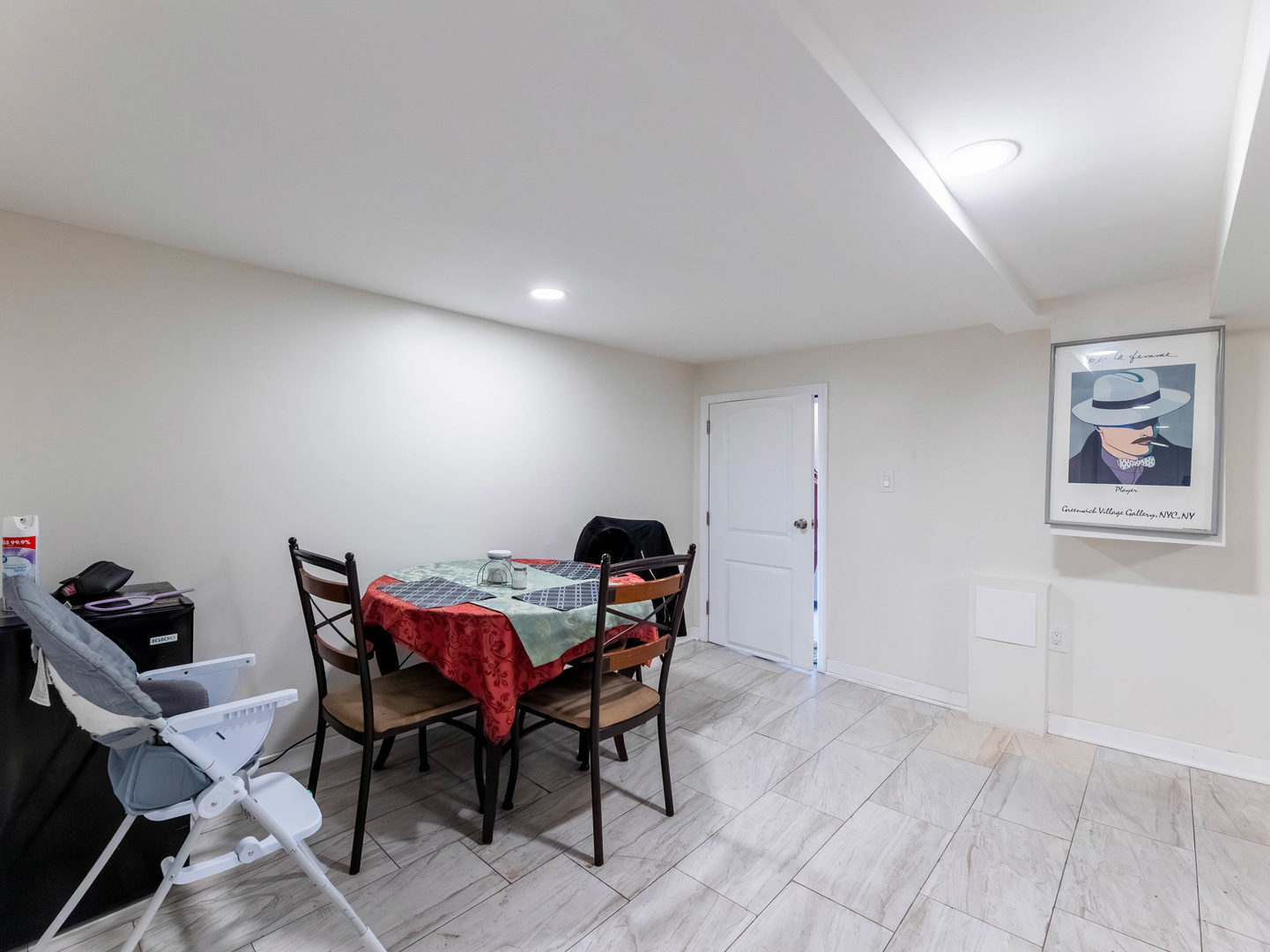 4747 West Monroe Street Chicago, IL 60644 - Photo 19 of 31 a view of a dining room with furniture and chandelier