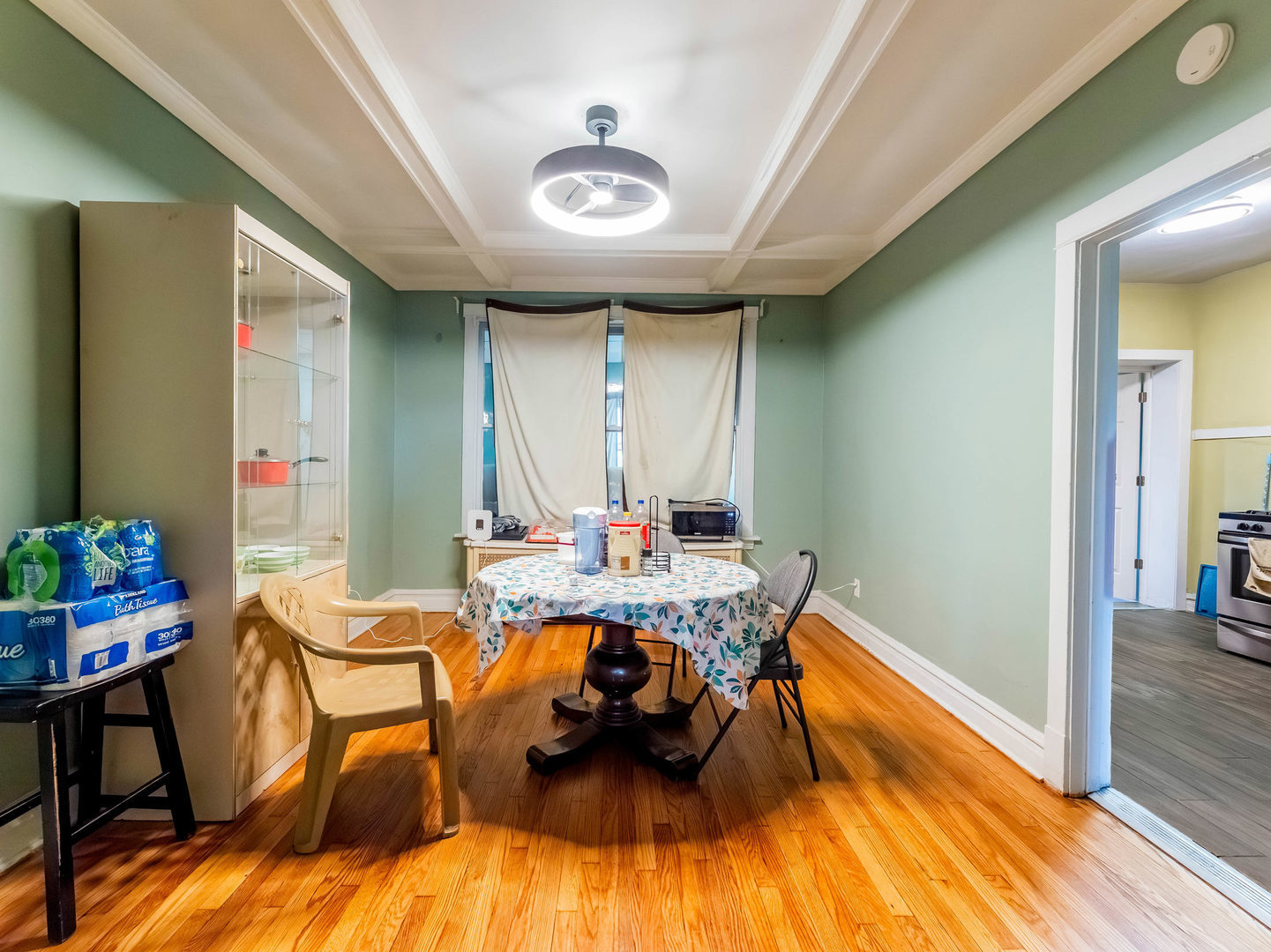 4747 West Monroe Street Chicago, IL 60644 - Photo 4 of 31 a view of a dining room with furniture and wooden floor