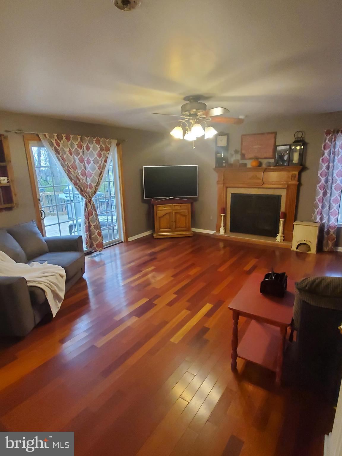 4515 Chestnut Ridge Drive Manchester, MD 21102 - Photo 14 of 47 Living room with glass sliders out to deck