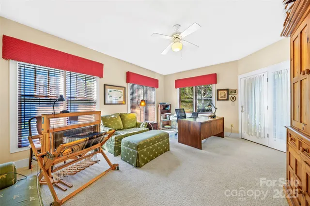 a bathroom with a granite countertop sink mirror and toilet