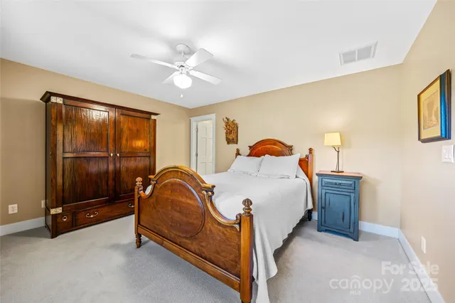 a bathroom with a granite countertop sink a mirror and a