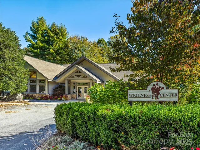 a view of an outdoor space and basketball court