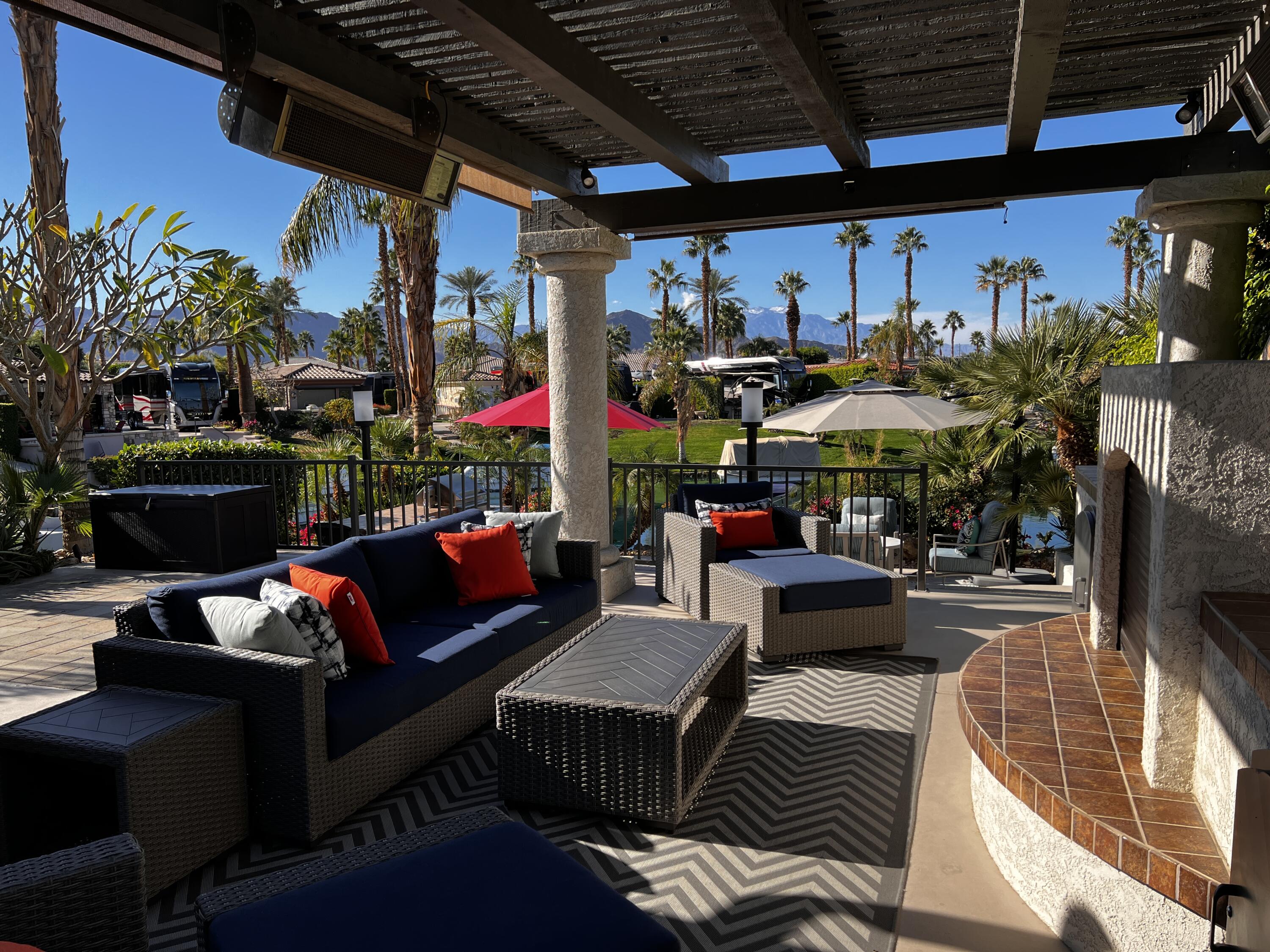 a outdoor living space with patio furniture and a potted plant