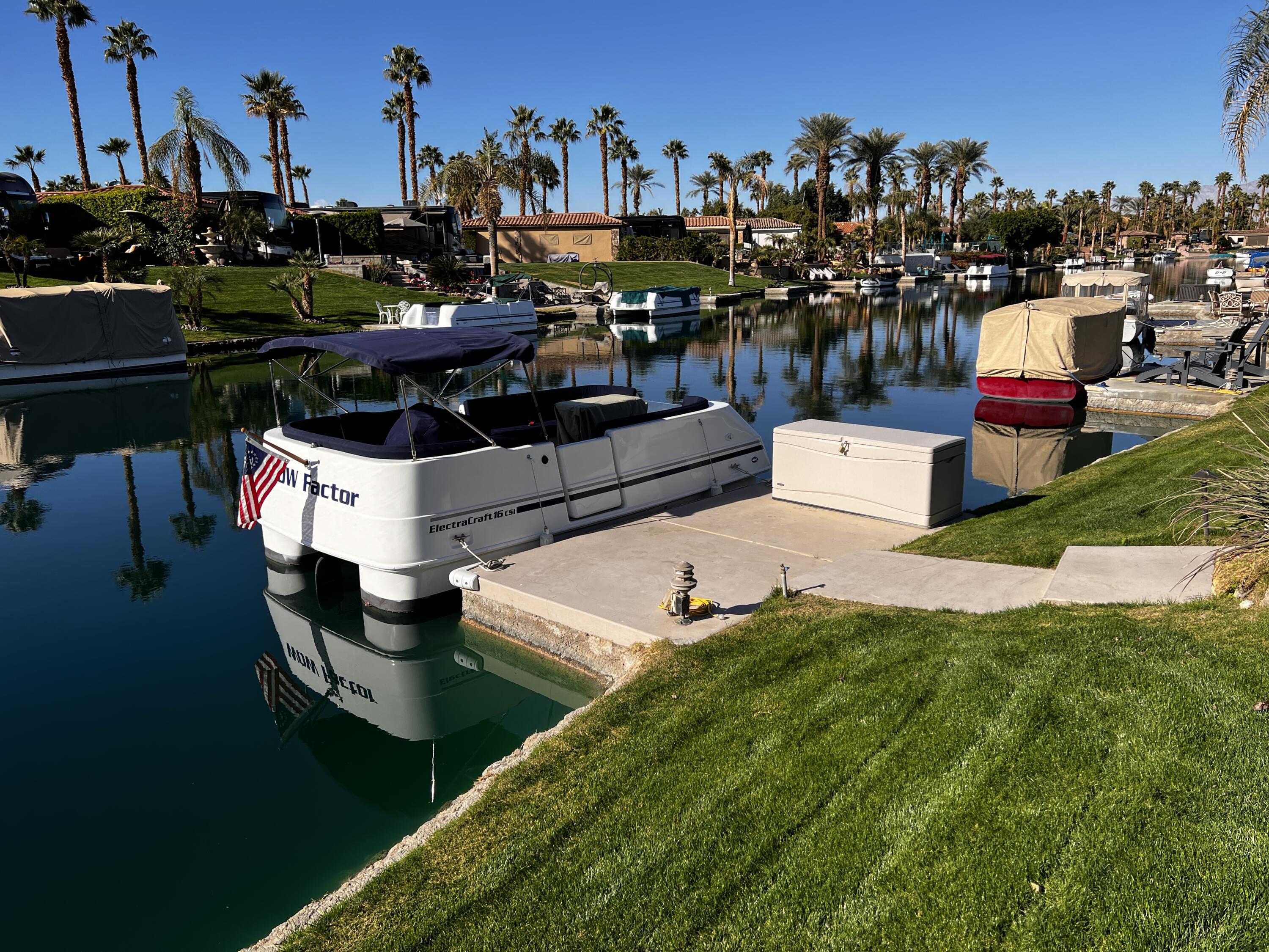 80501 Ave 48, Unit 110 Indio, CA 92201 - Photo 22 of 35 a view of a chairs and table in the patio