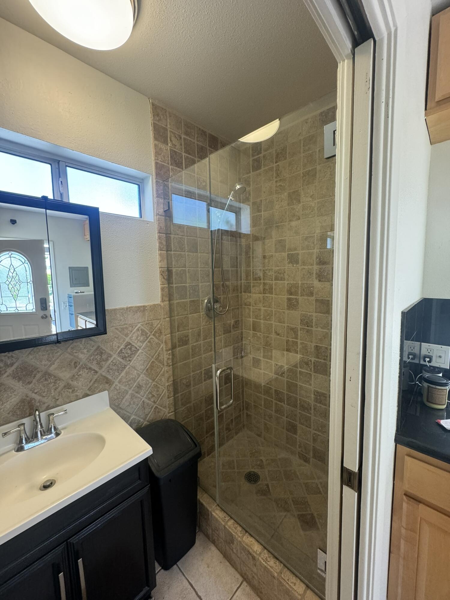 80501 Ave 48, Unit 110 Indio, CA 92201 - Photo 34 of 35 a bathroom with a sink and a mirror