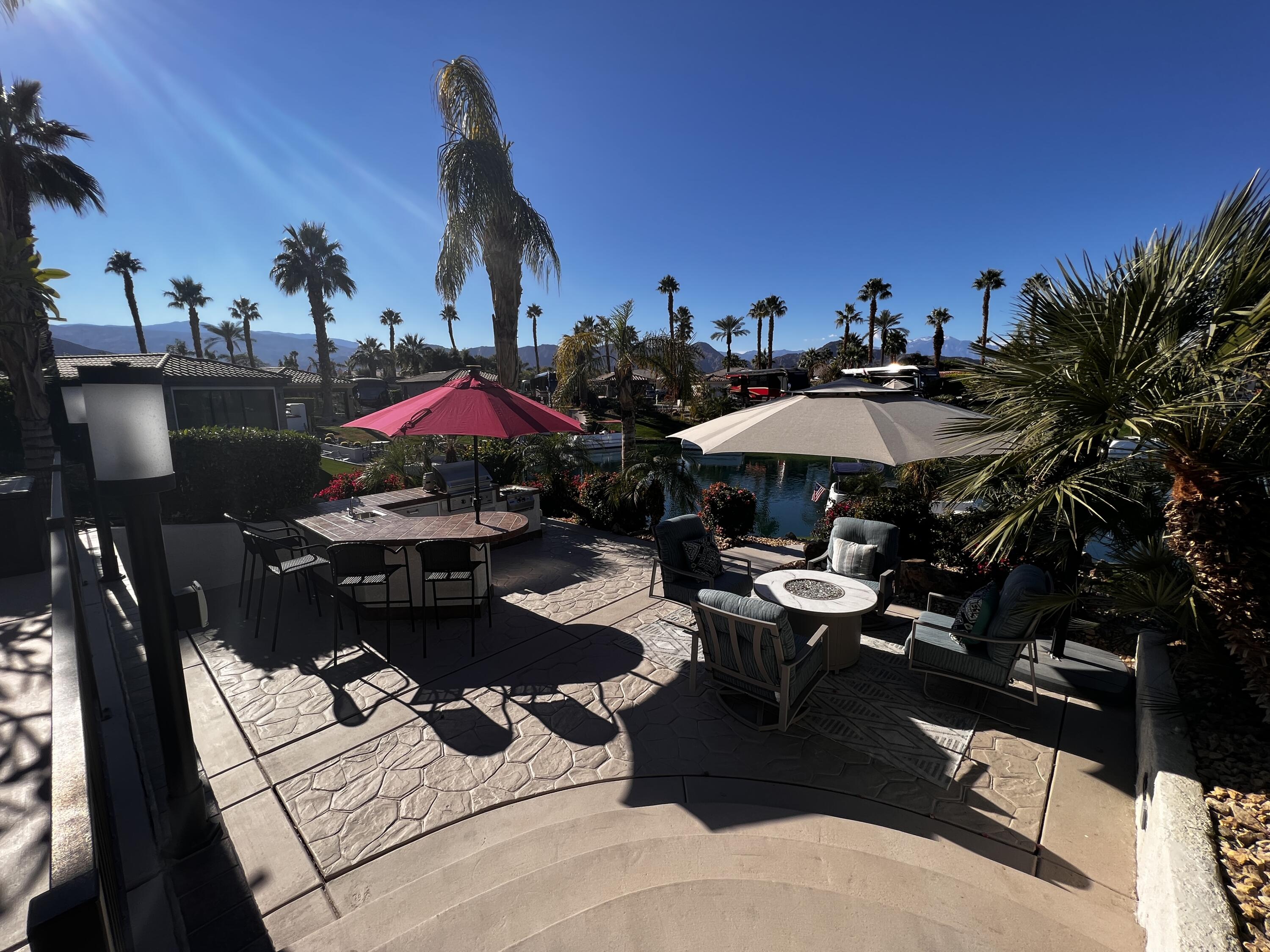 80501 Ave 48, Unit 110 Indio, CA 92201 - Photo 9 of 35 a view of a terrace with sitting area