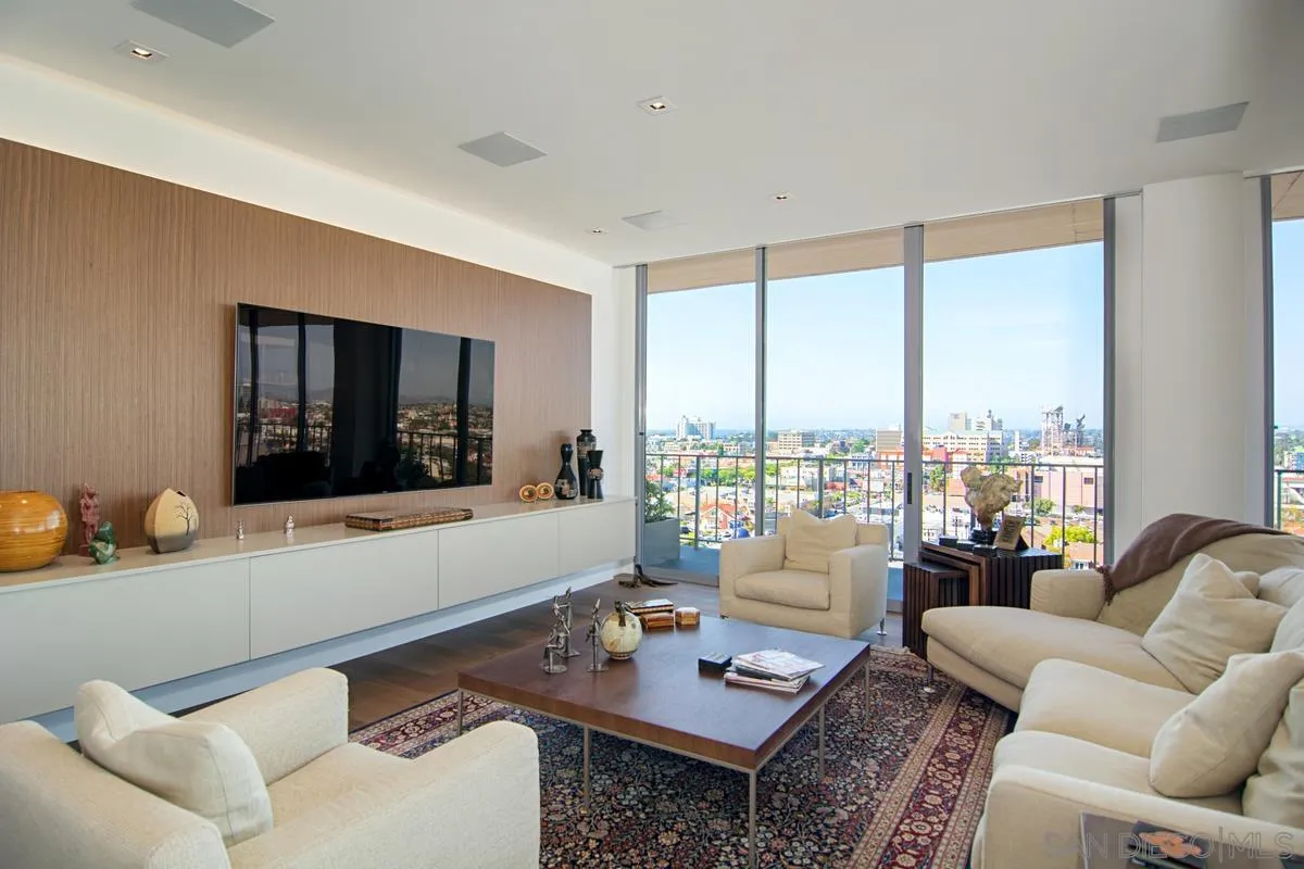 3634 7th Avenue, Unit 14H San Diego, CA 92103 - Photo 1 of 41 a living room with furniture and a large window