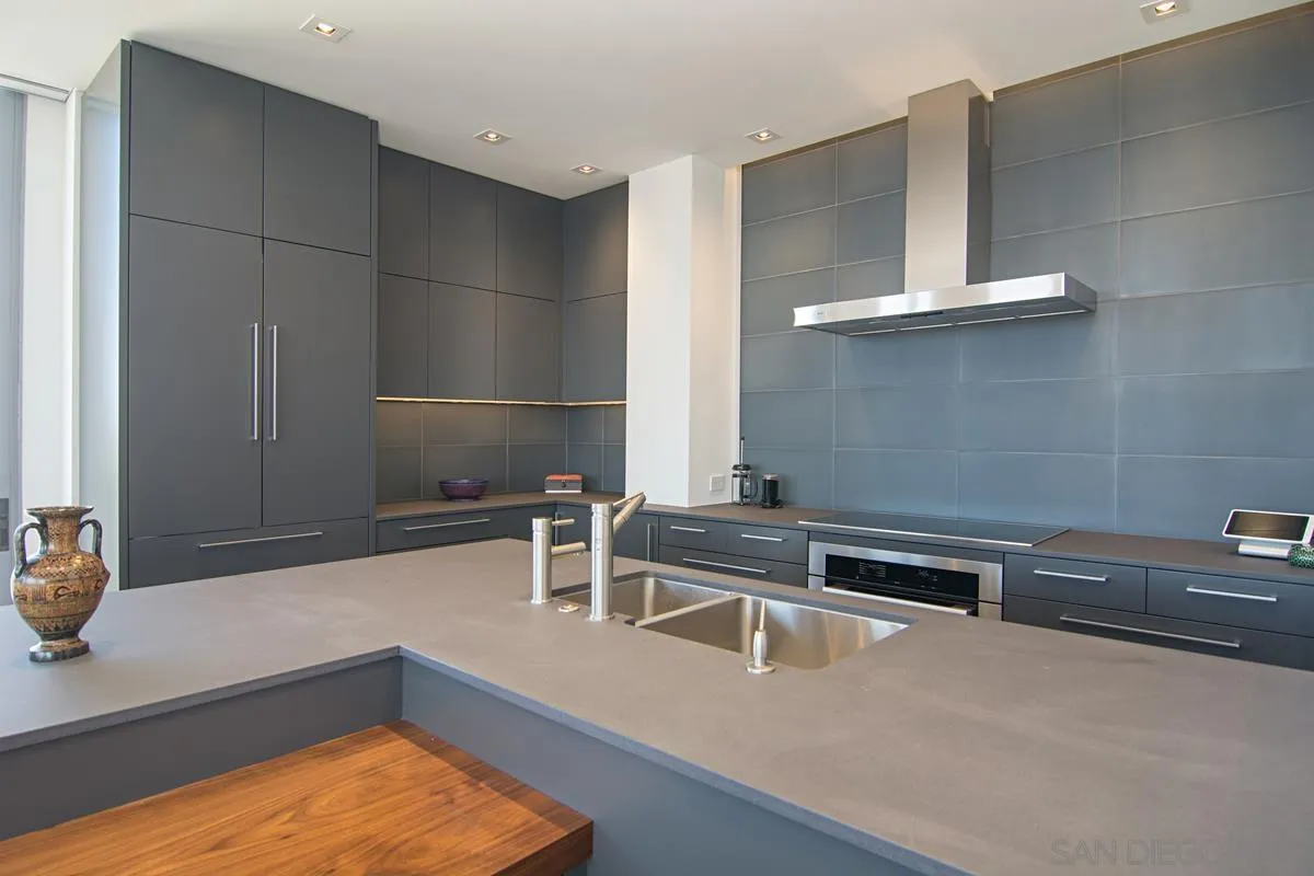 3634 7th Avenue, Unit 14H San Diego, CA 92103 - Photo 11 of 41 a kitchen with a sink and cabinets