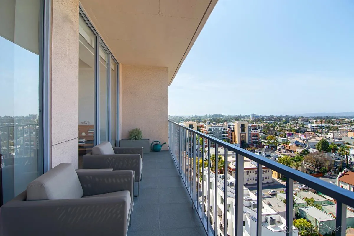 3634 7th Avenue, Unit 14H San Diego, CA 92103 - Photo 35 of 41 a balcony with furniture and city view