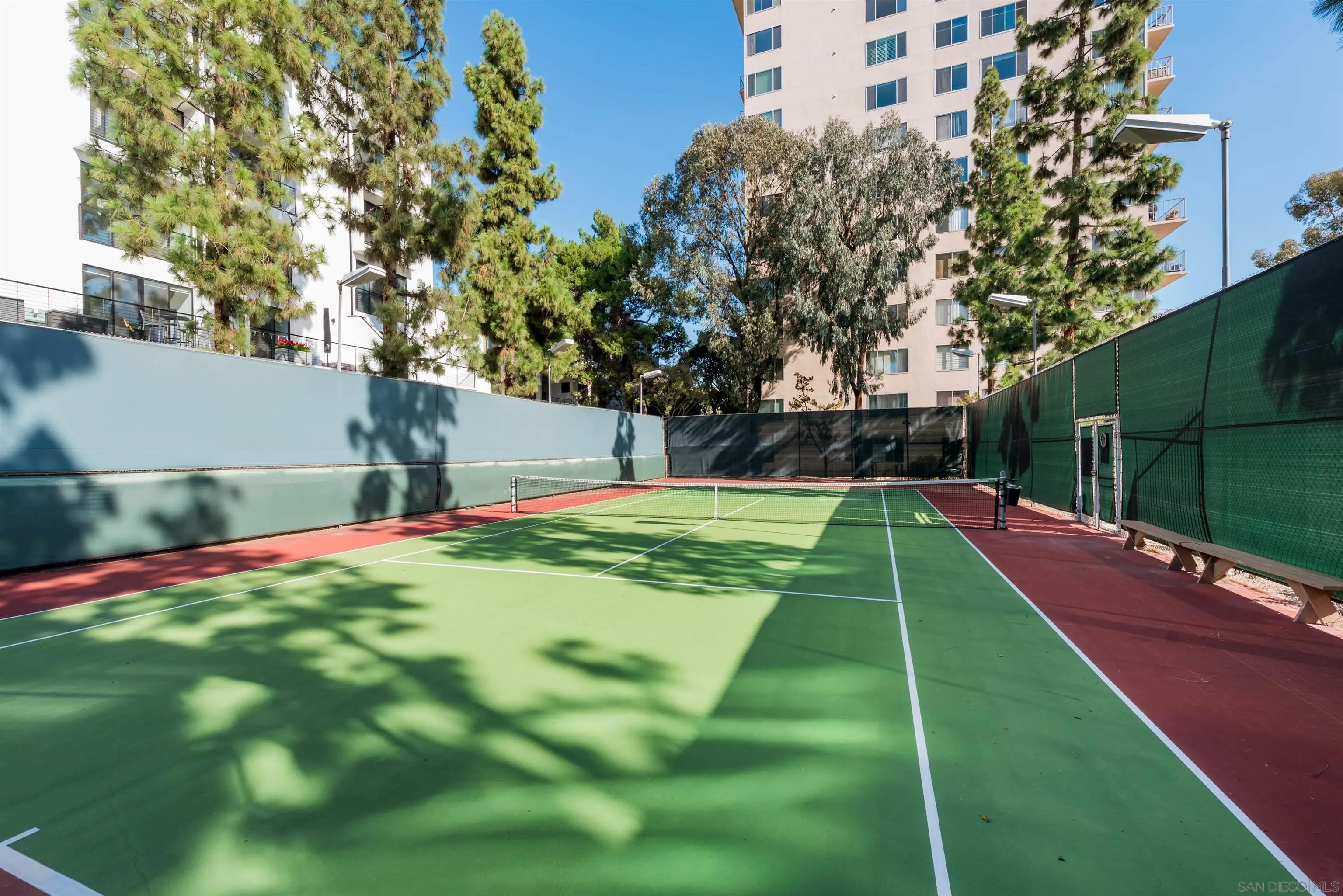 3634 7th Avenue, Unit 14H San Diego, CA 92103 - Photo 37 of 41 a view of a backyard with a small pool