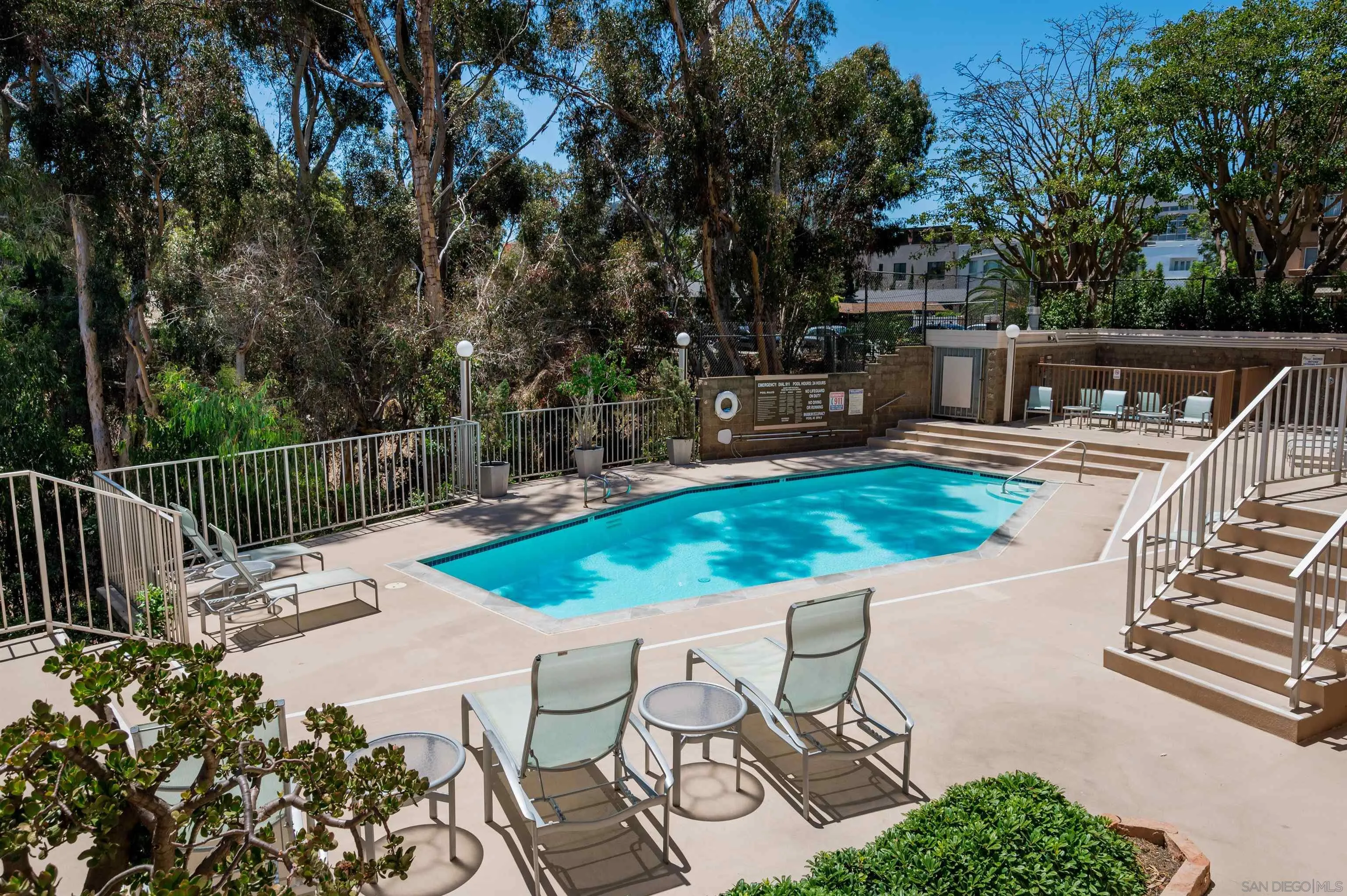 3634 7th Avenue, Unit 14H San Diego, CA 92103 - Photo 38 of 41 a view of a swimming pool with a patio