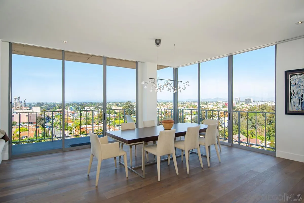 3634 7th Avenue, Unit 14H San Diego, CA 92103 - Photo 4 of 41 a dining room with furniture window and wooden floor