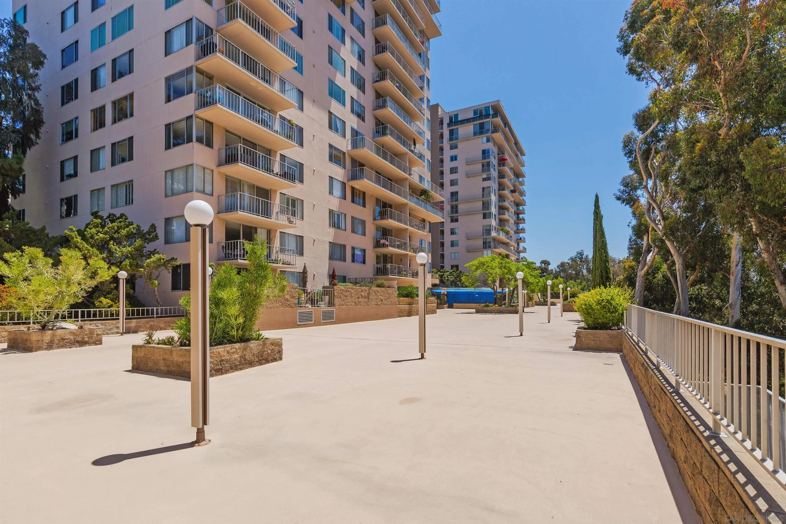 3634 7th Avenue, Unit 14H San Diego, CA 92103 - Photo 41 of 41 a view of a building with a bench