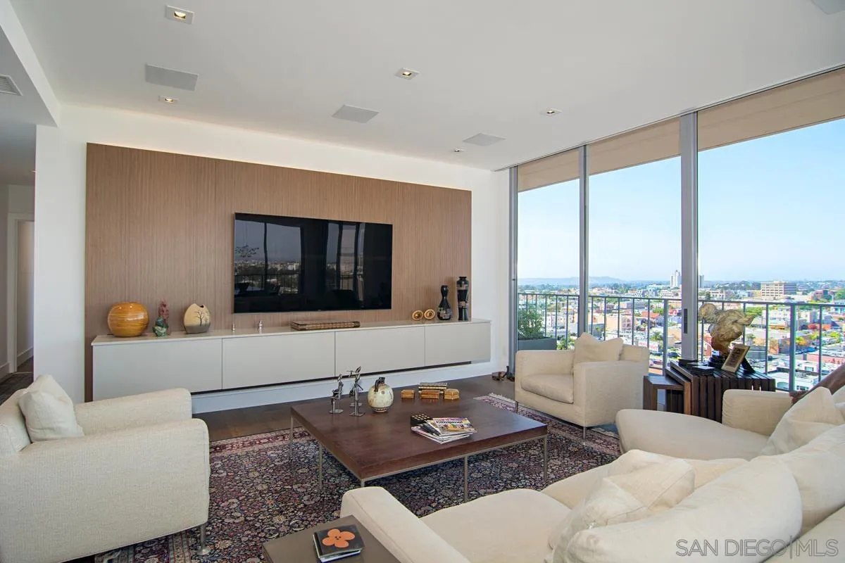 3634 7th Avenue, Unit 14H San Diego, CA 92103 - Photo 5 of 41 a living room with furniture and a large window