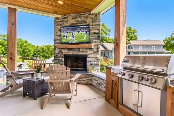 a outdoor living space with furniture and a potted plant