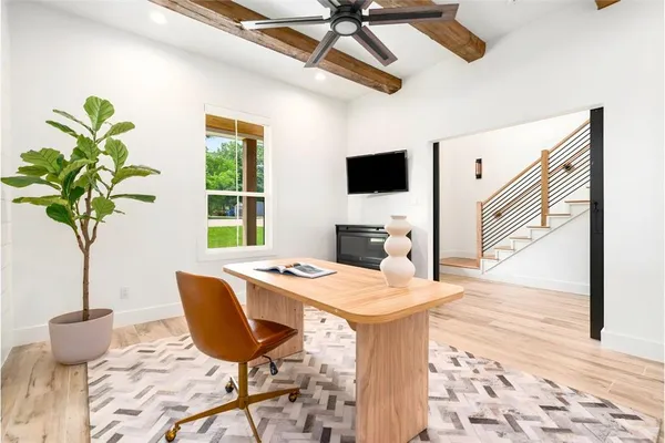 a dining room with furniture and window