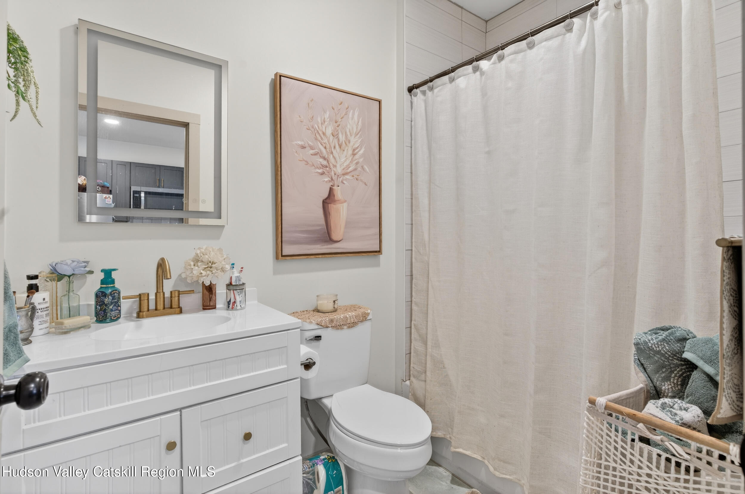 3-5 Dutchtown Road Saugerties, NY 12477 - Photo 24 of 25 a bathroom with a toilet a sink and a mirror