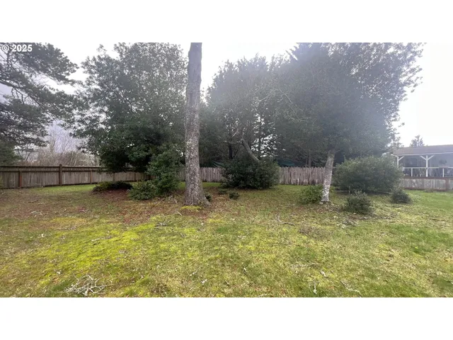 a black and white photo of a house
