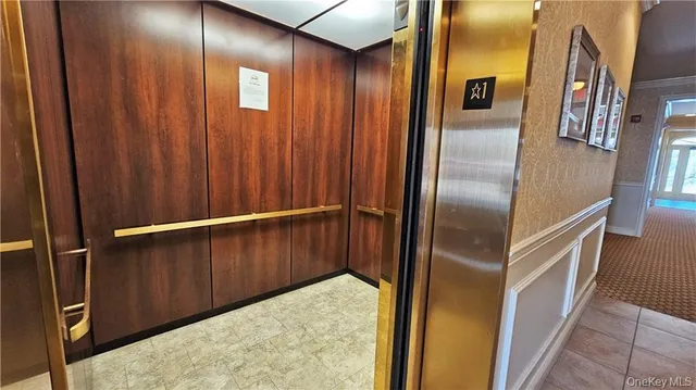 a view of entryway with a front door