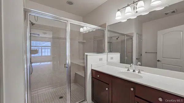 a bathroom with a sink a toilet and bathtub