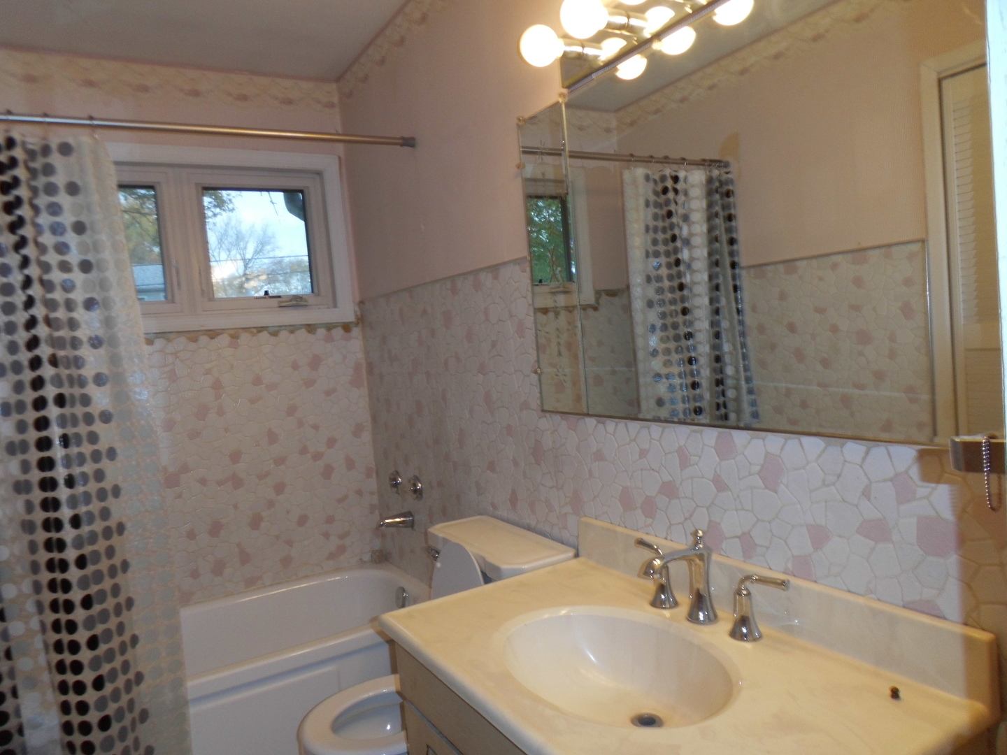 520 Redwood Road Bolingbrook, IL 60440 - Photo 14 of 18 a bathroom with a sink a toilet and shower