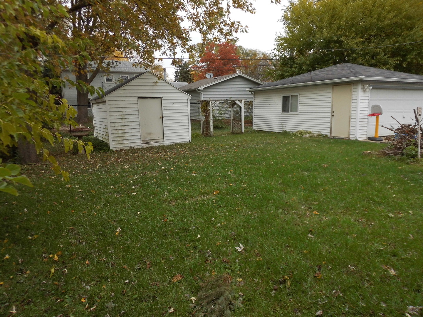 520 Redwood Road Bolingbrook, IL 60440 - Photo 16 of 18 a front view of a house with a garden