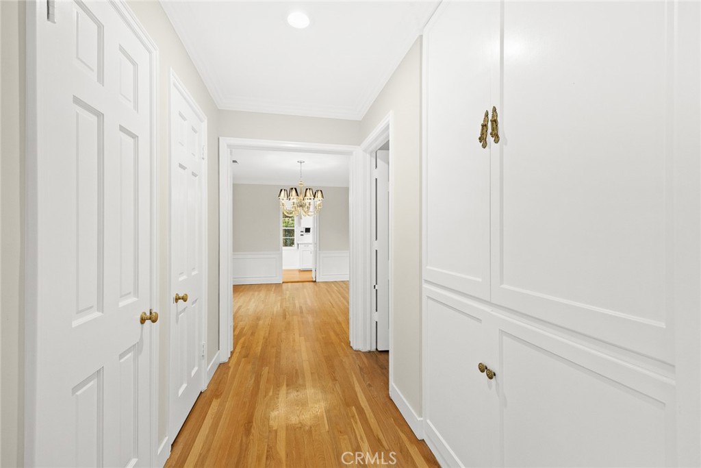 1300 Ramona Road Arcadia, CA 91006 - Photo 15 of 39 a view of a hallway with wooden floor and staircase