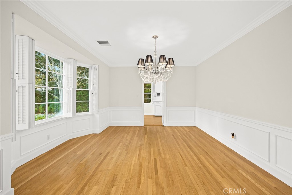 1300 Ramona Road Arcadia, CA 91006 - Photo 16 of 39 a view of empty room with wooden floor and fan