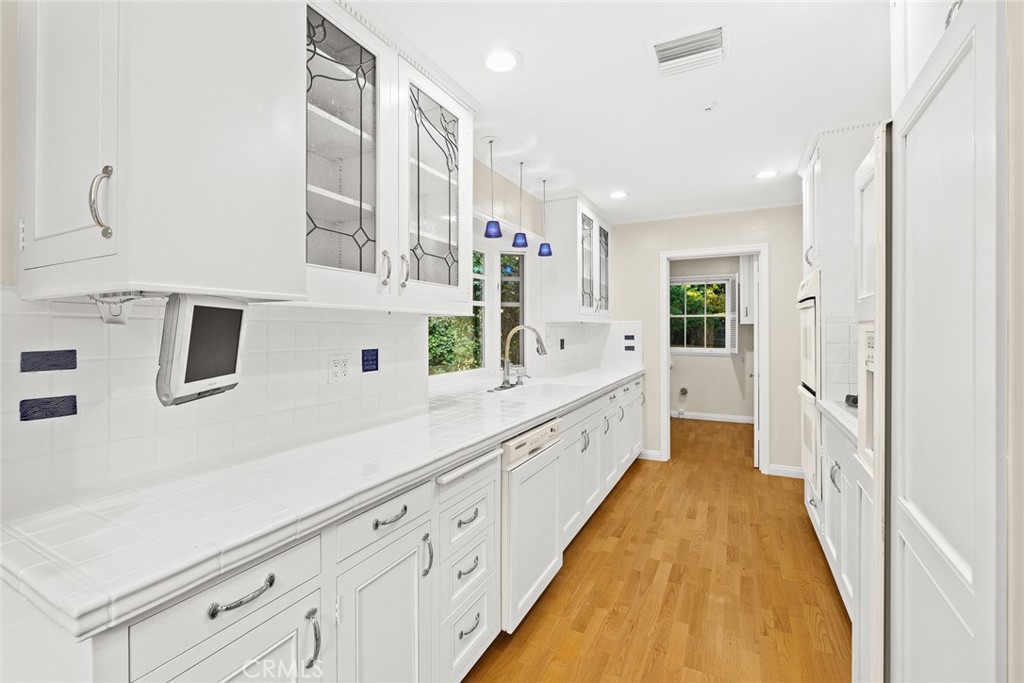 1300 Ramona Road Arcadia, CA 91006 - Photo 18 of 39 a spacious bathroom with a double vanity sink a mirror and a bathtub