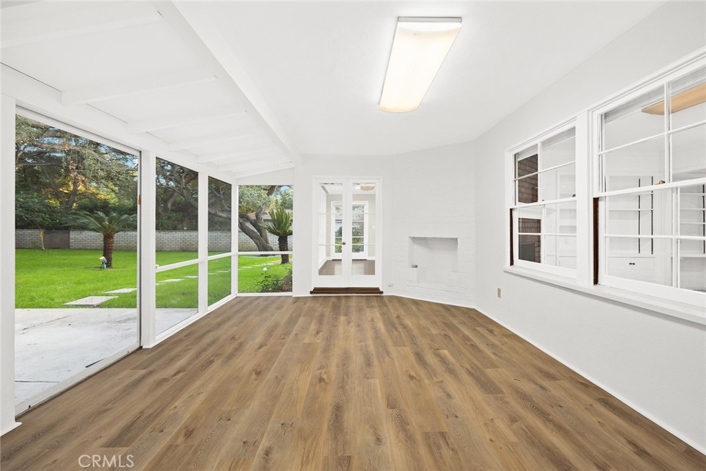 1300 Ramona Road Arcadia, CA 91006 - Photo 22 of 39 a view of an empty room with wooden floor and a window