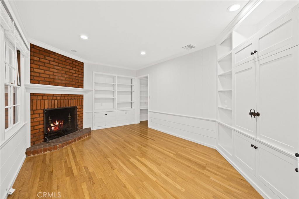 1300 Ramona Road Arcadia, CA 91006 - Photo 24 of 39 a bedroom with a bed and a fireplace