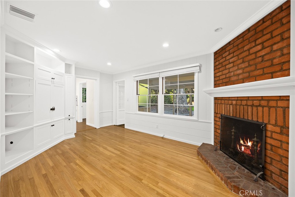 1300 Ramona Road Arcadia, CA 91006 - Photo 25 of 39 a bedroom with a bed and a fireplace