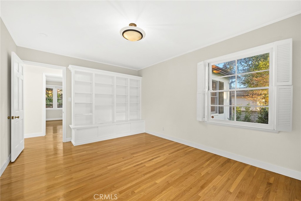 1300 Ramona Road Arcadia, CA 91006 - Photo 28 of 39 a view of empty room with wooden floor and fan
