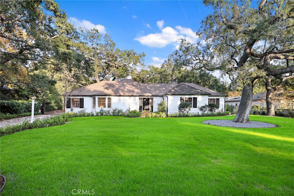 1300 Ramona Road Arcadia, CA 91006 - Photo 9 of 39 a front view of a house with a garden