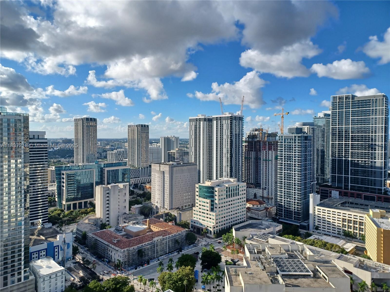 133 Northeast 2nd Avenue, Unit 412 Miami, FL 33132 - Photo 29 of 32 a view of a city with tall buildings