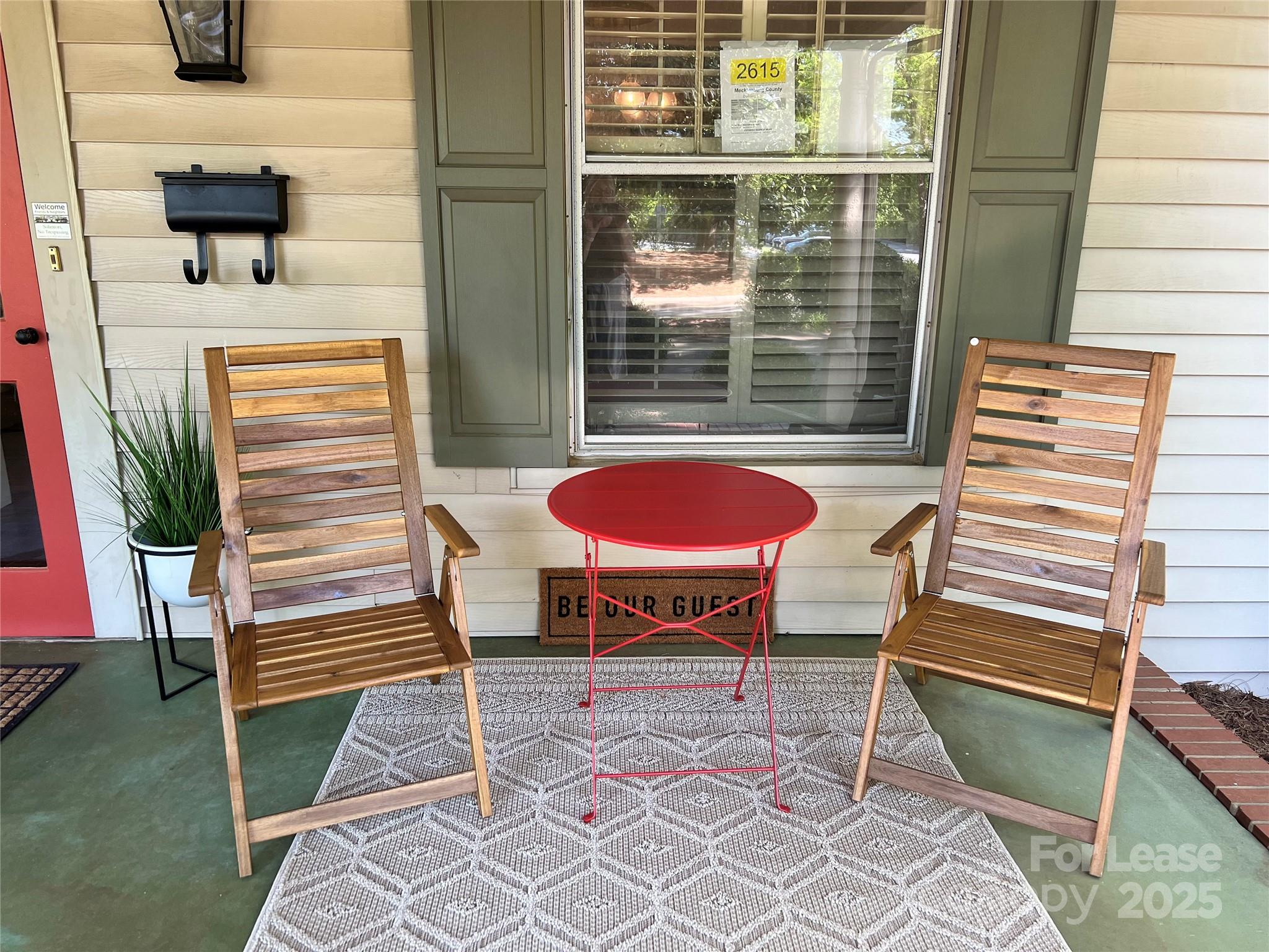 2615 Sharon Road Charlotte, NC 28211 - Photo 11 of 21 a balcony with table and chairs