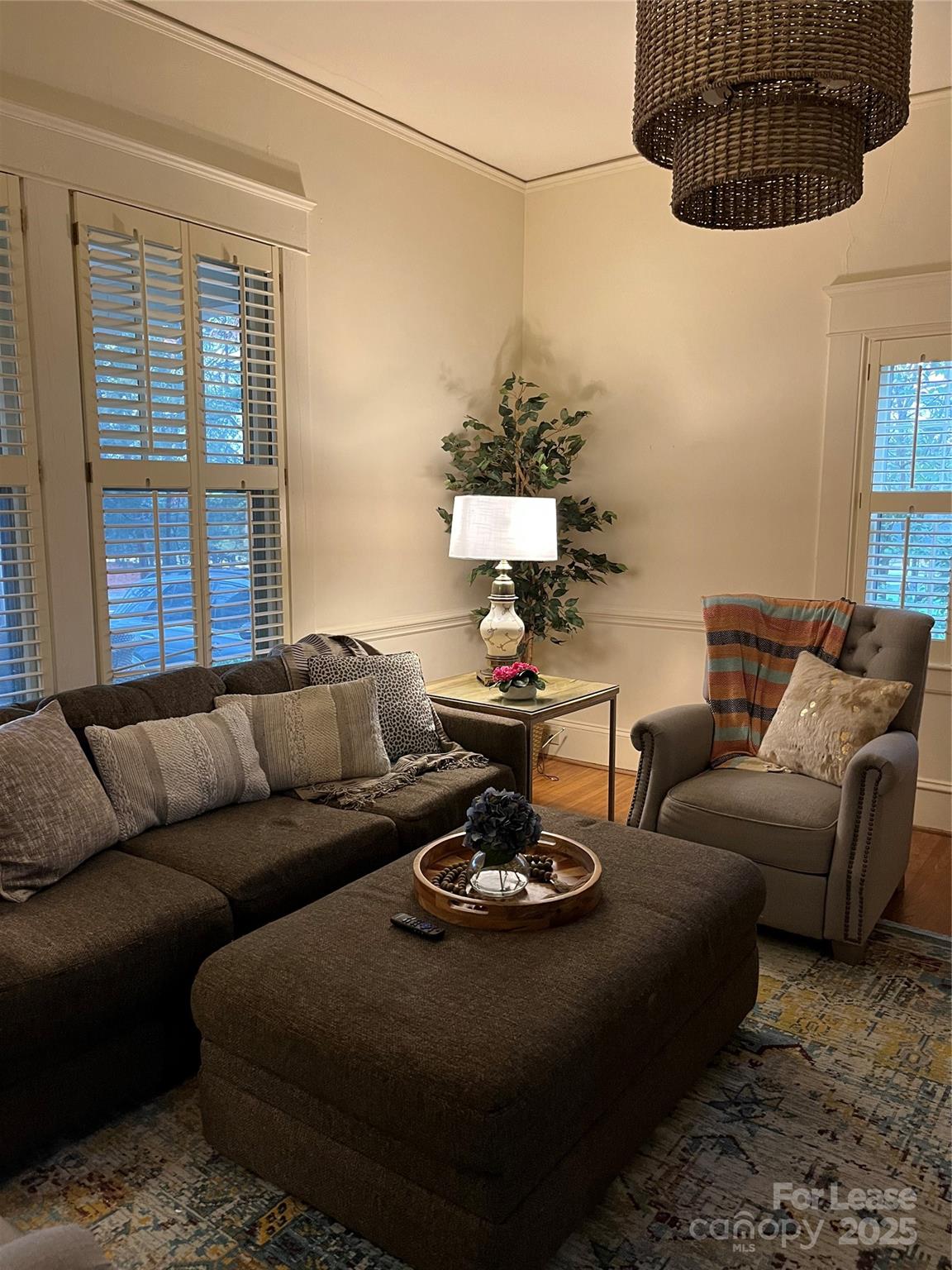 2615 Sharon Road Charlotte, NC 28211 - Photo 18 of 21 a living room with furniture a table and a window